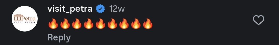Instagram comment from visit_petra, the official verified Petra tourism account, reacting with fire emojis